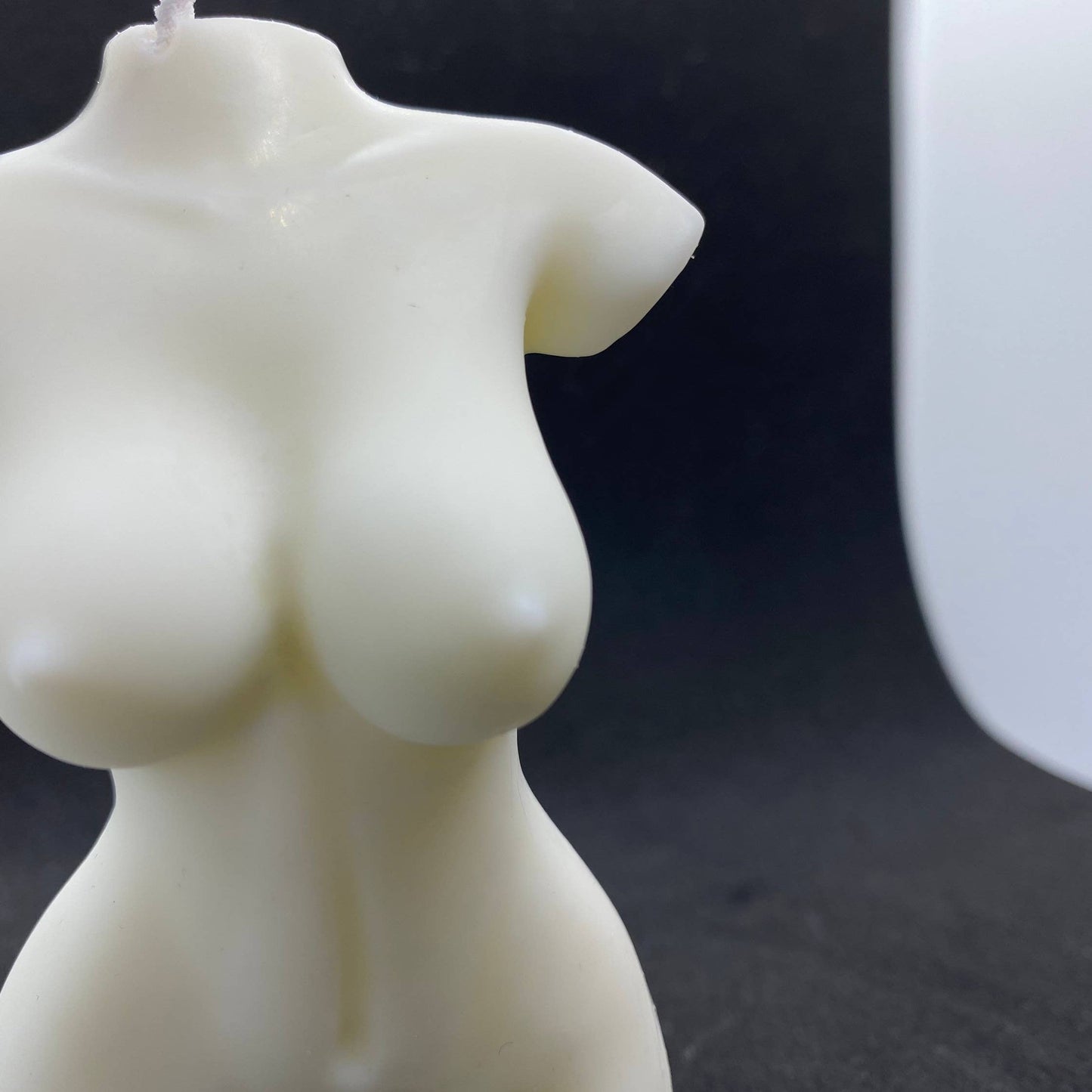 The Female body curves boob candle